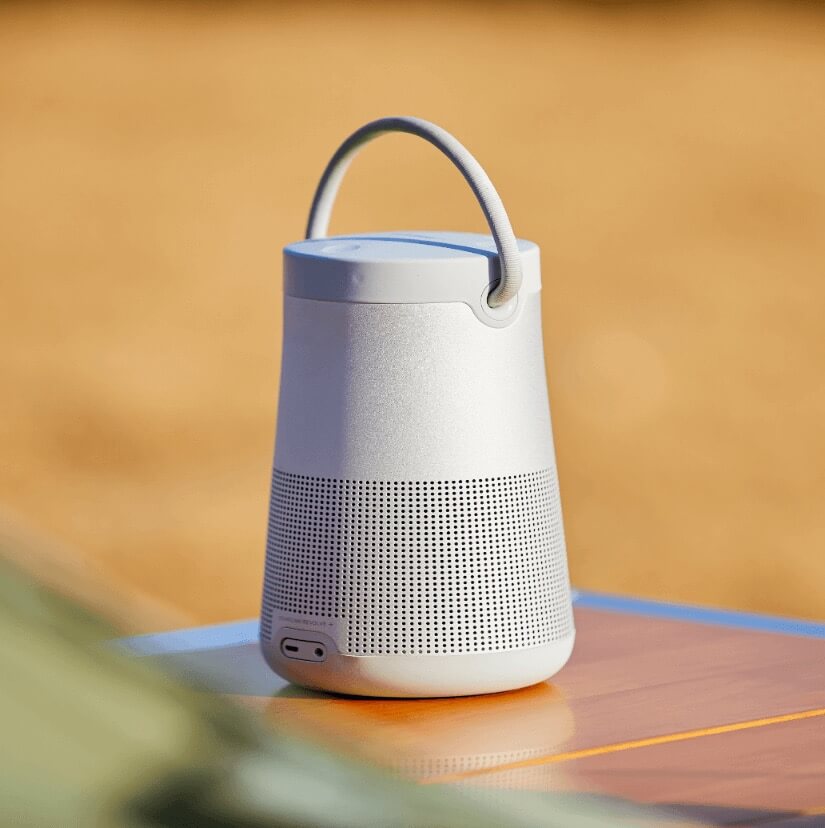 a bluetooth speaker on a table