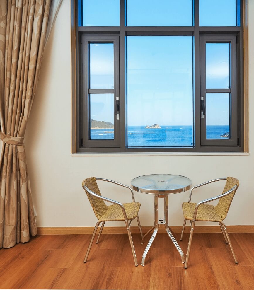 room amenities and the view of the ocean from the window